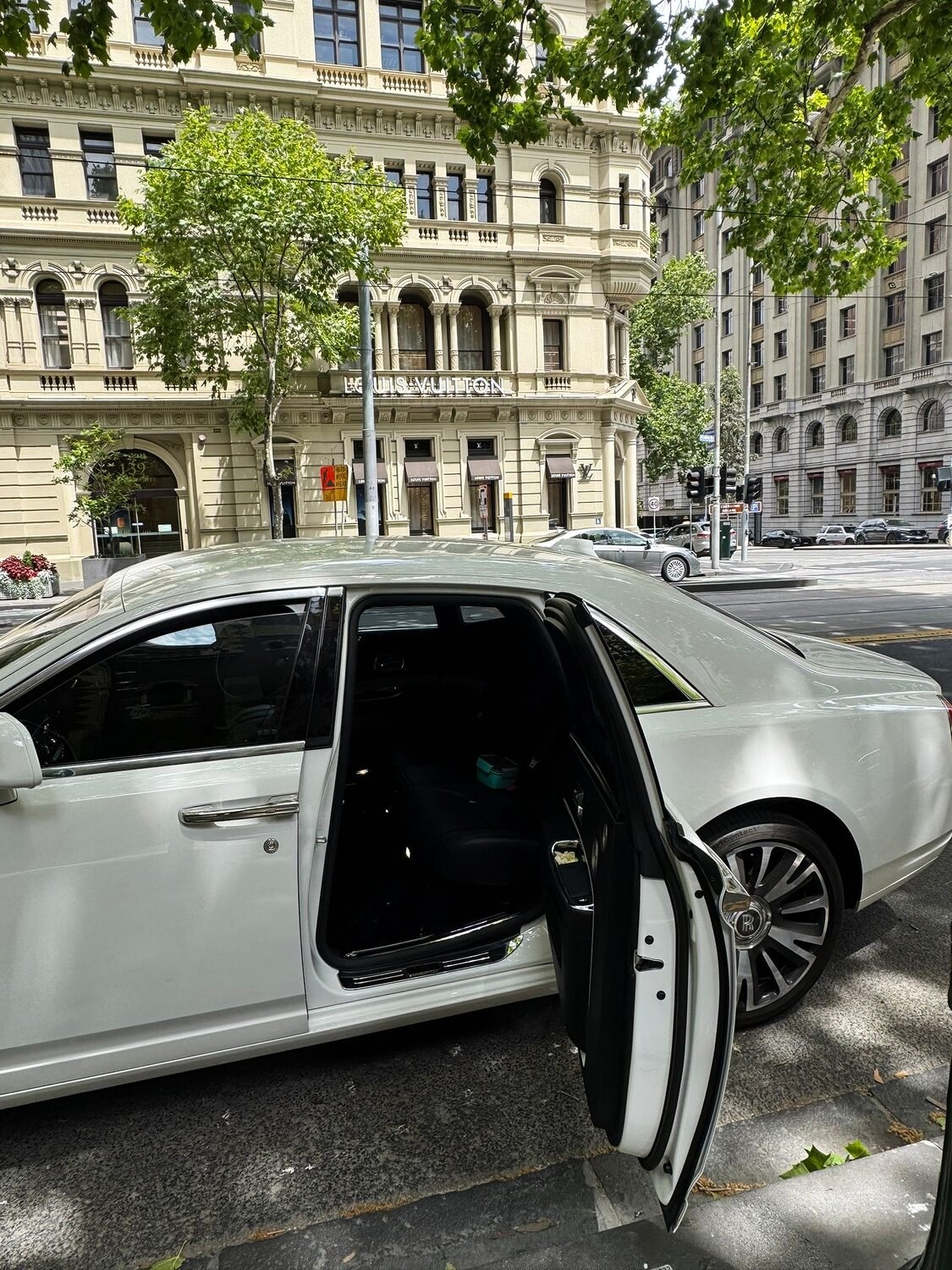 White Rolls-Royce, door open